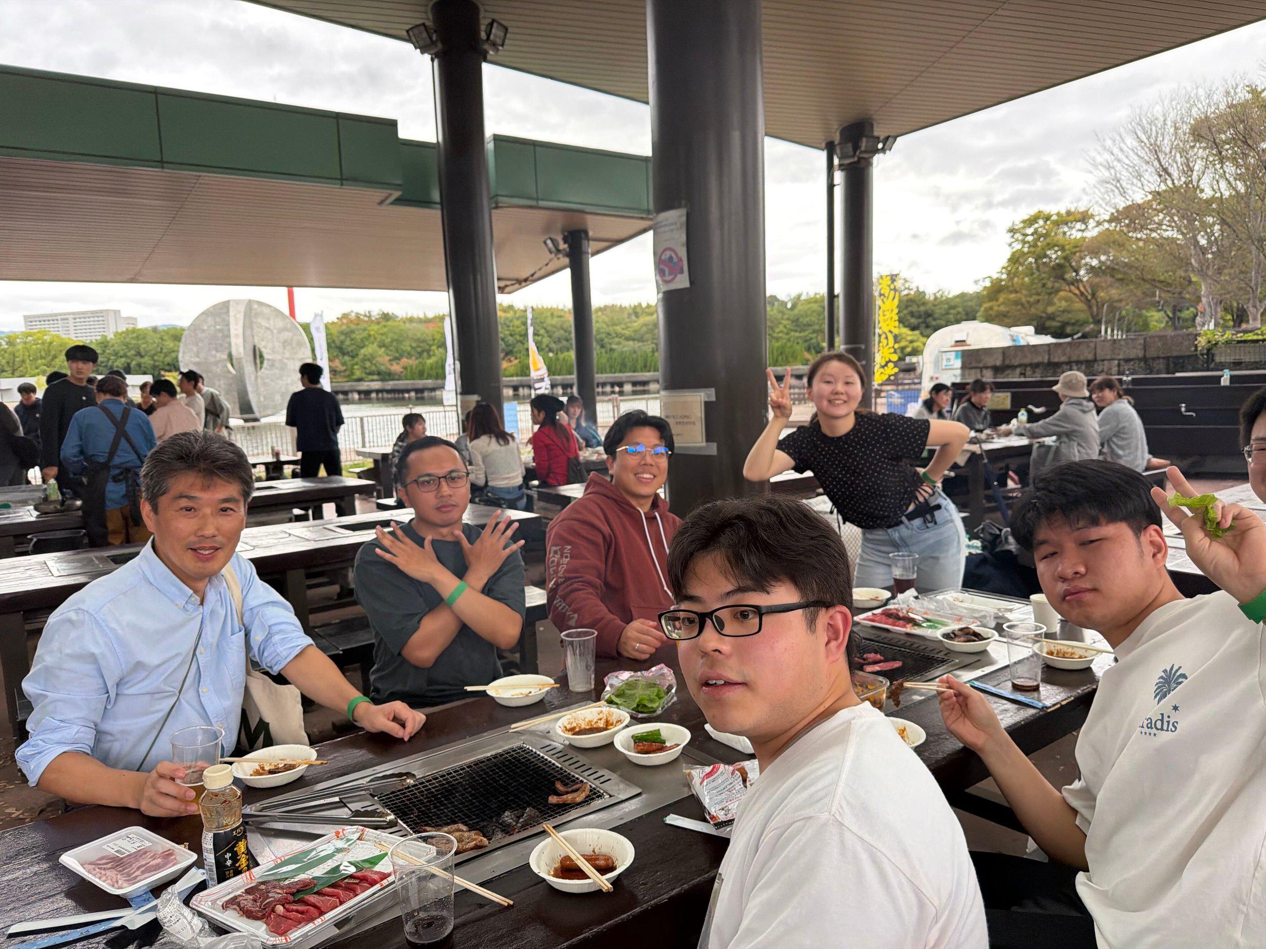Faculty and students sharing a table
